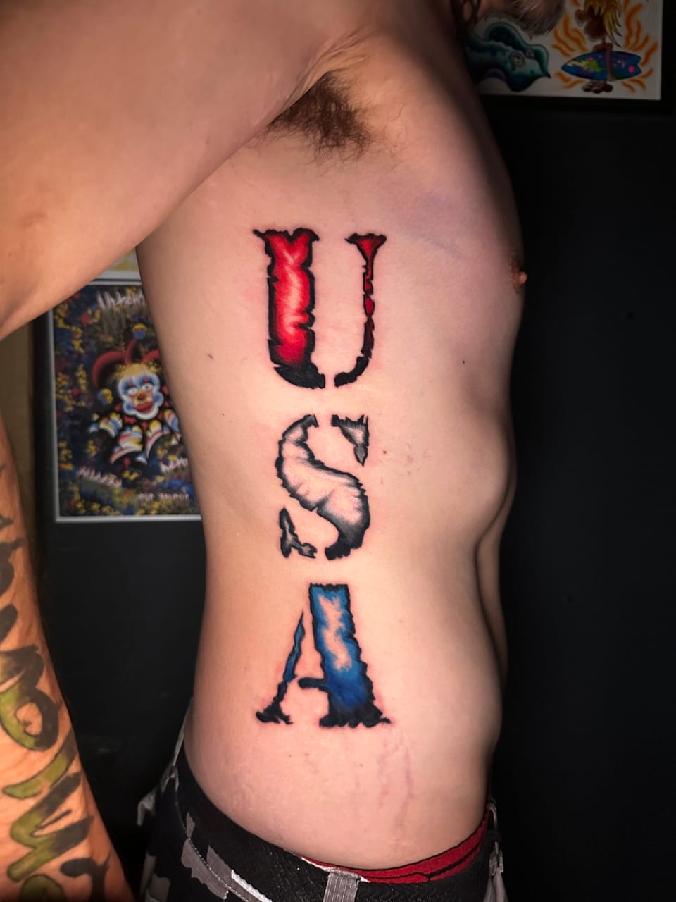 Red, white and blue USA lettering runs vertically along the ribs.