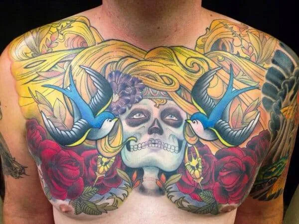 A man with a skull and rose new school tattoo on his chest.