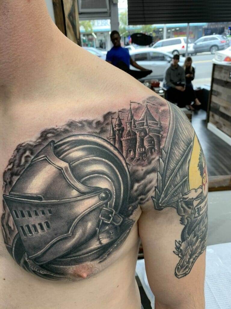 A man with a tattoo of a knight on his chest.