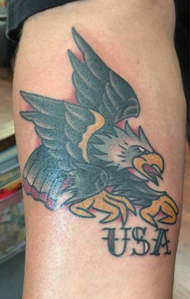 A tattoo featuring an eagle with the word USA incorporated.