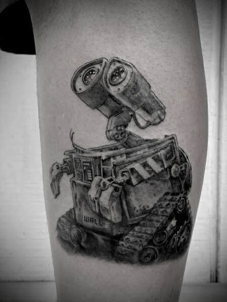 Wall e tattoo on the thigh.