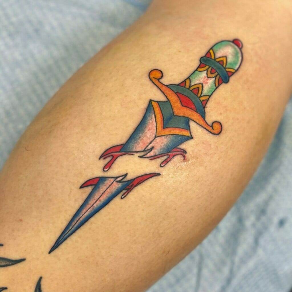 A tattoo of a sword on a person's forearm.