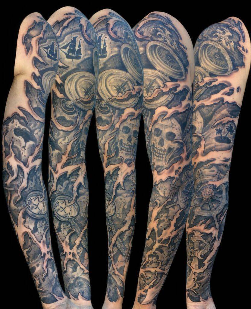 A sleeve of tattoos on a man's arm.