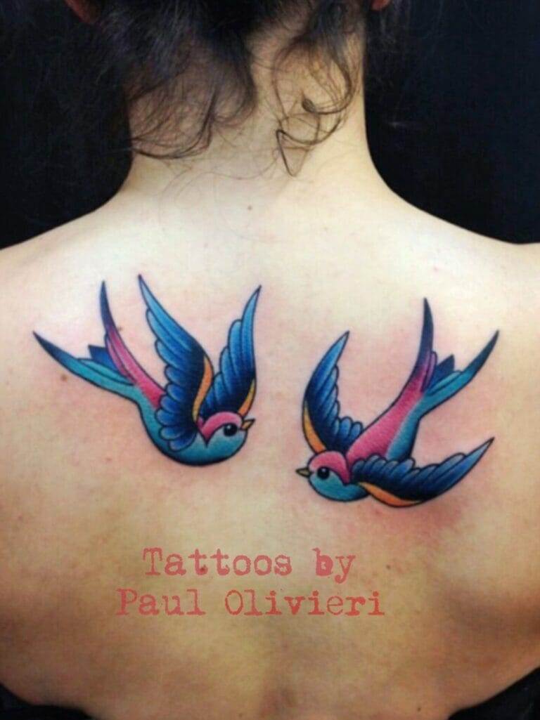 Two swallow tattoos by paul olivieri.