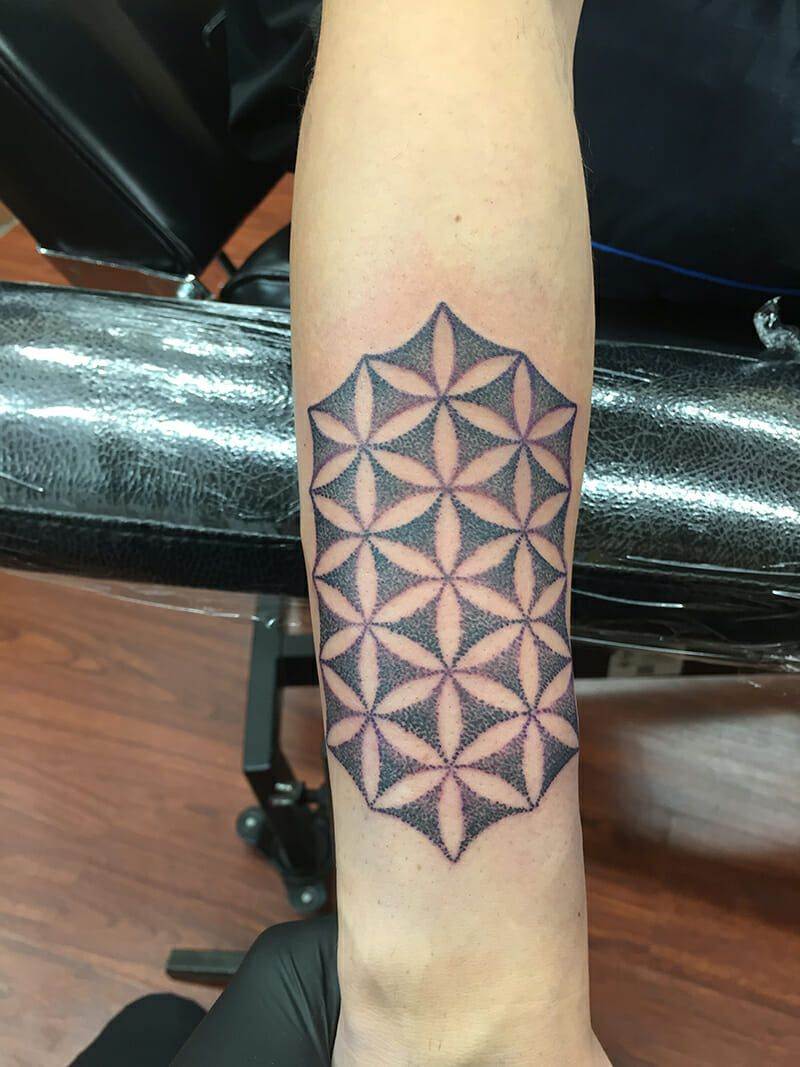 sacred geometry dot work stipple tattoo
