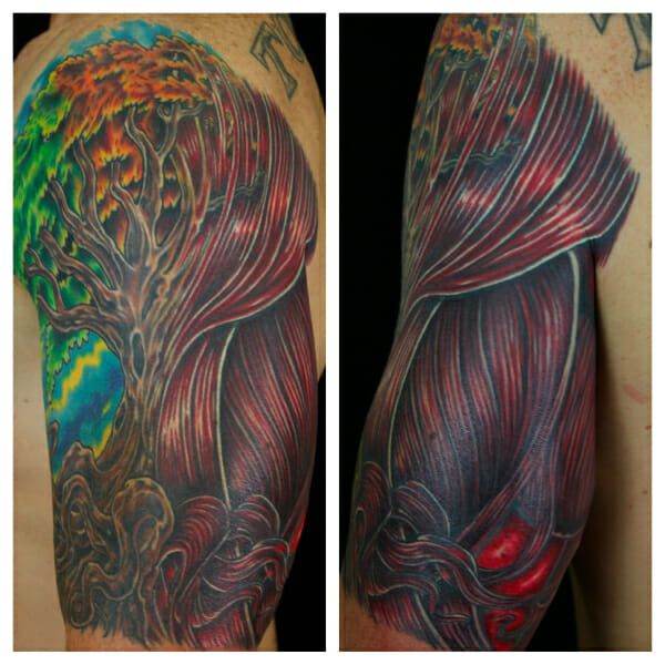 A man's sleeve with an image of a tree and muscles.