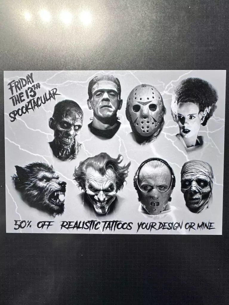 Poster advertising Friday the 13th tattoo specials with illustrations of iconic horror characters, offering 50% off realistic tattoos with the text "Your design or mine.
