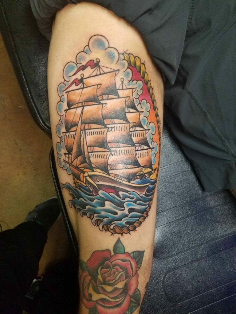 Sailing ship with billowing sails, surrounded by clouds and waves, and a rose below.