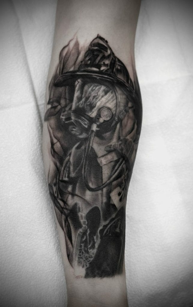 Black and gray tattoo of a person wearing headphones and a gas mask, with a silhouette of a girl at the bottom.