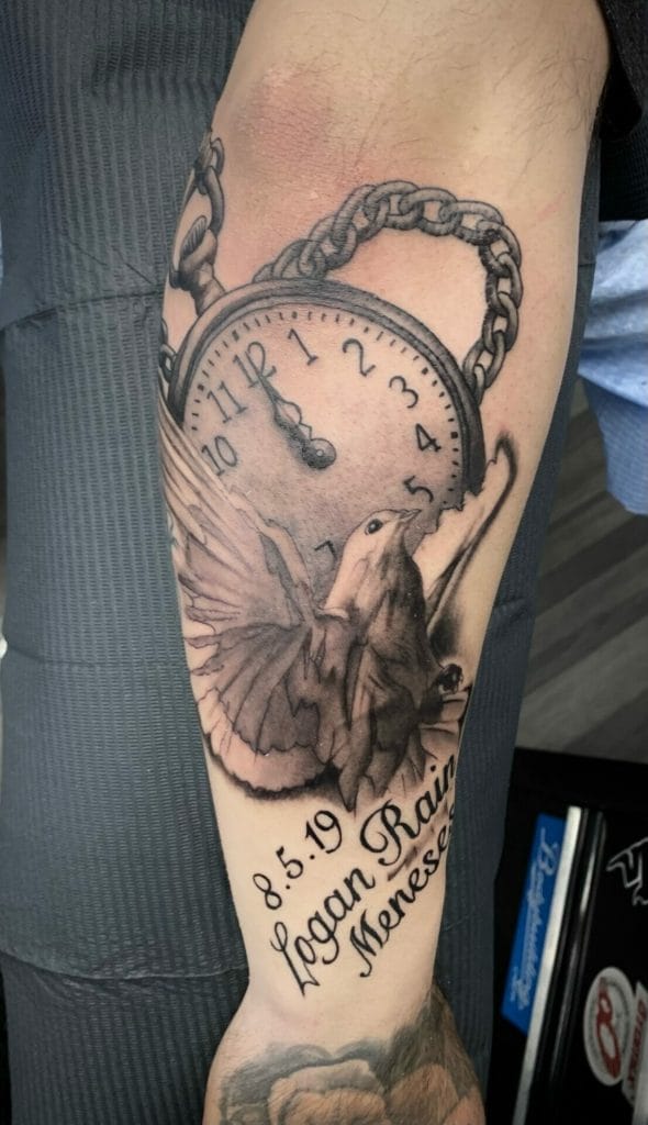 Pocket watch showing 10:55, butterfly, and the text 8.5.19 Logan Rain Mores on arm tattoo.