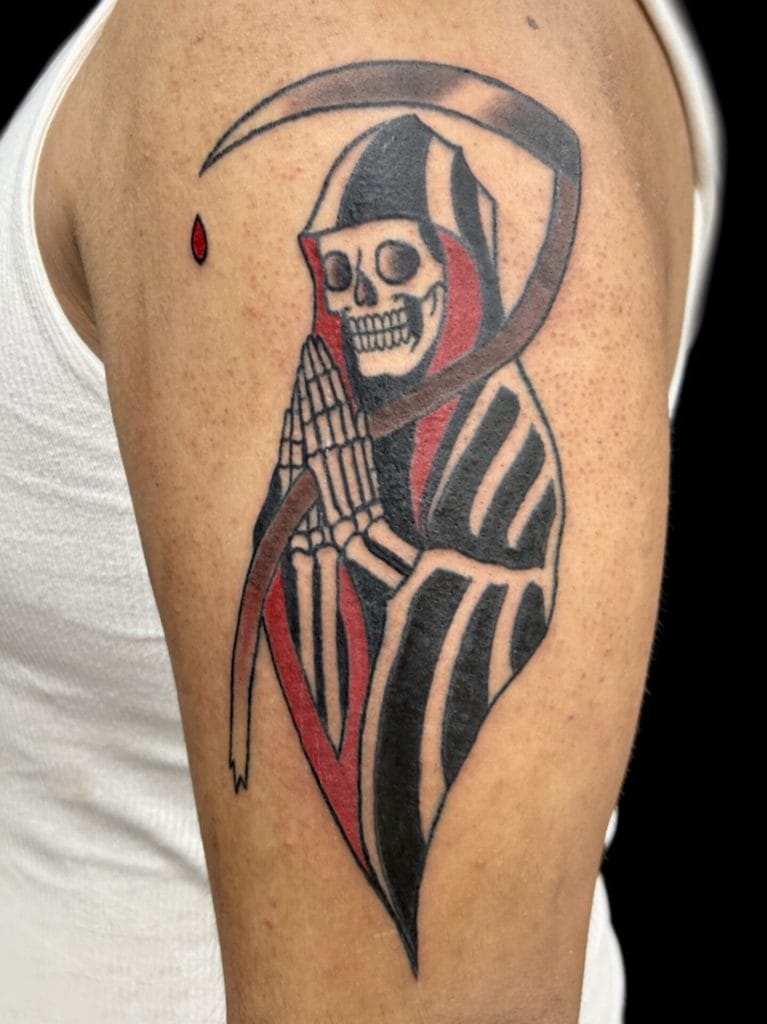 Skull with praying hands, hooded figure, and scythe in black, red, and gray ink.