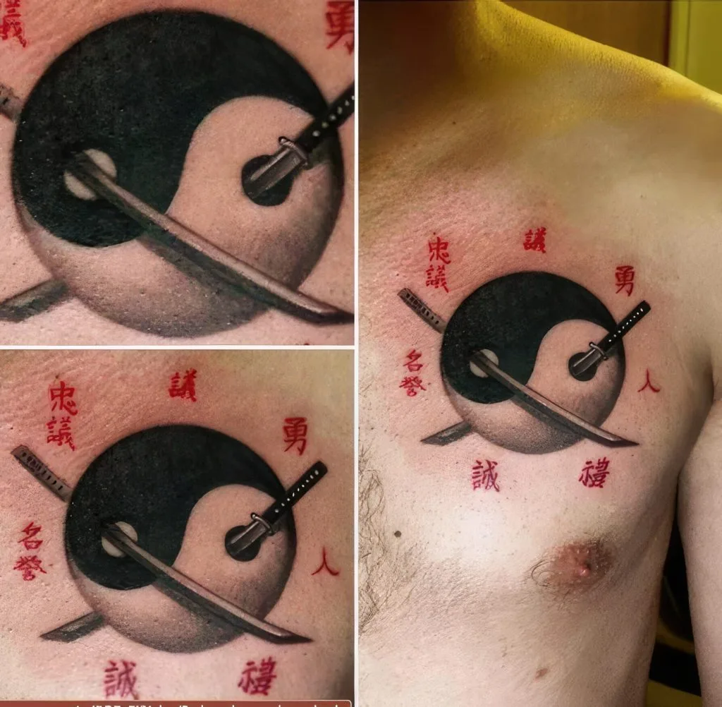 Tattoo of a yin-yang symbol with swords and red Chinese characters on a persons chest.
